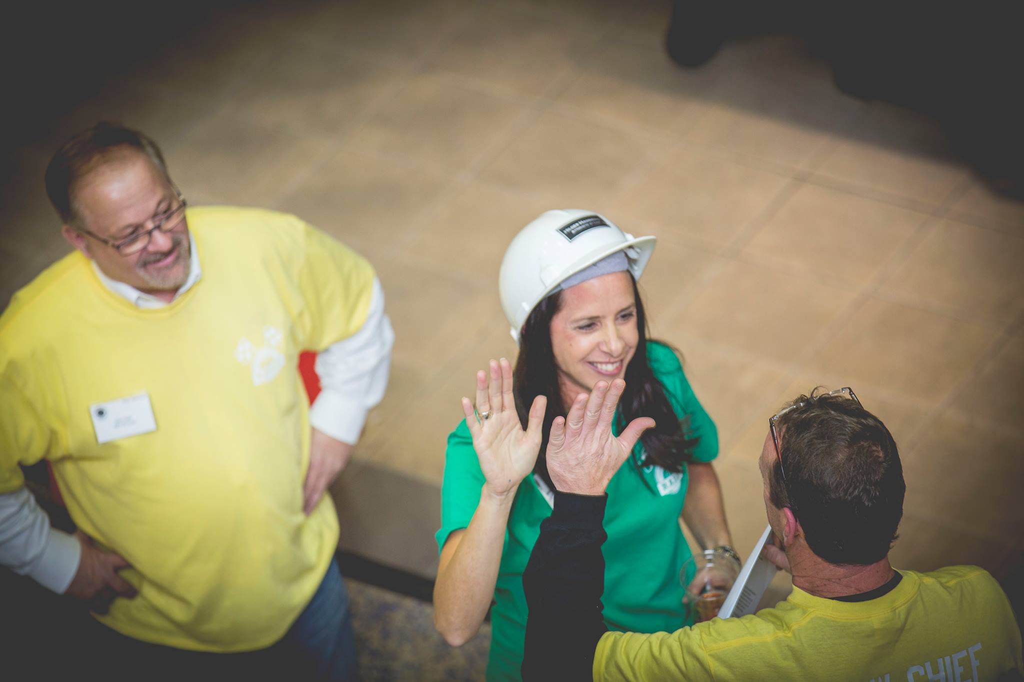 Aileen Lepprandt in hard hat at ABC West Michigan fundraising rally